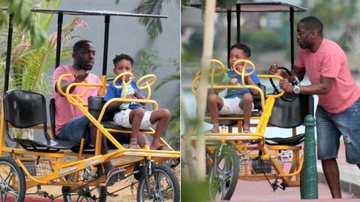 Lázaro Ramos curte passeio de triciclo com o filho, João Vicente - AgNews