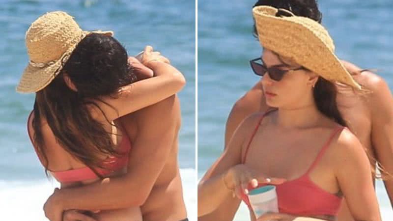 A atriz Isis Valverde troca caricias com o maridão em uma praia carioca e é surpreendida por fãs; confira as imagens - Reprodução/AgNews
