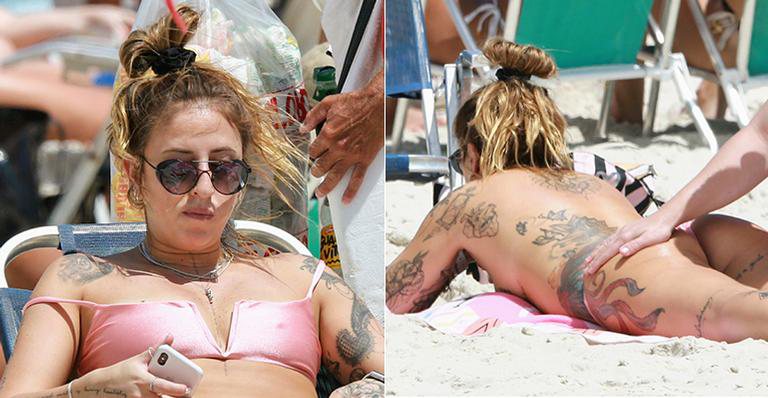 Jennifer Bifão causa, tira a parte de cima do biquíni e exibe corpão em dia na praia - AgNews