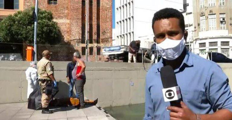 Repórter da Globo pula na água e salva homem que foi eletrocutado - TV Globo/Reprodução
