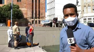 Repórter da Globo pula na água e salva homem que foi eletrocutado - TV Globo/Reprodução