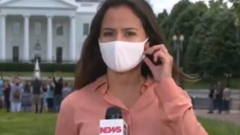 Raquel Krähenbühl pôde tirar a máscara ao vivo na Globo News - Reprodução/Globo News
