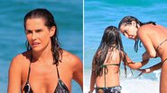 O tempo voa! Deborah Secco vai à praia com a filha Maria Flor que surge enorme - Fabricio Pioyani/ AgNews